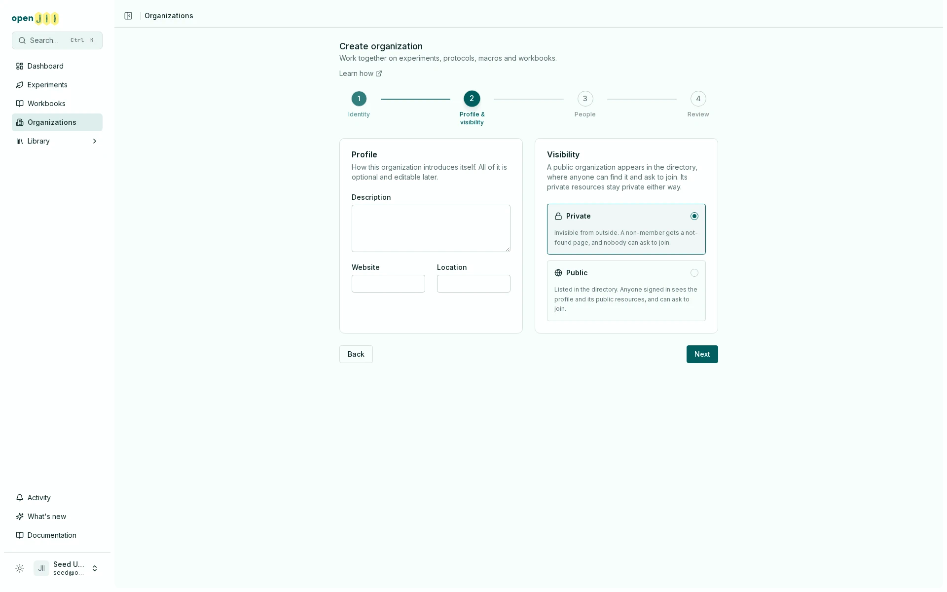 Step 2 of the create-organization wizard, Profile and visibility, with Private selected and both options describing what they mean for who can find the organization
